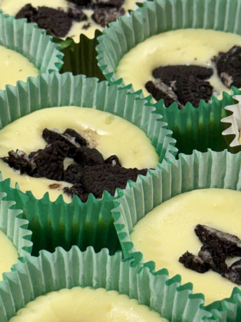 New York style oreo cheesecake in green cupcake liners for St Patricks Day!